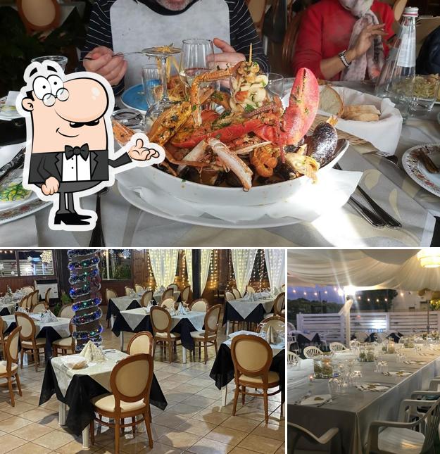 La interni e tavolo da pranzo del ristorante