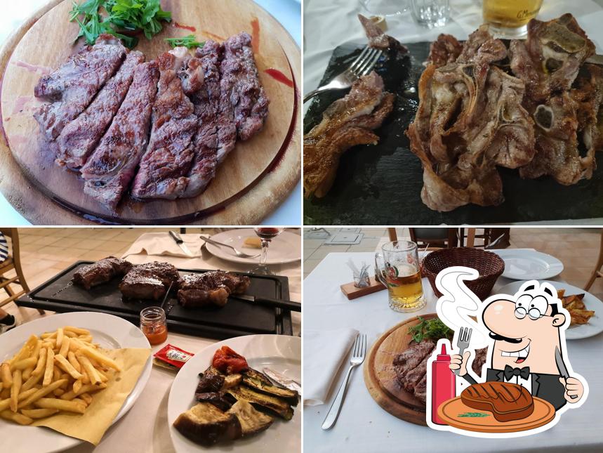 Piatti di carne vengono serviti a Il Battibecco Ristorante