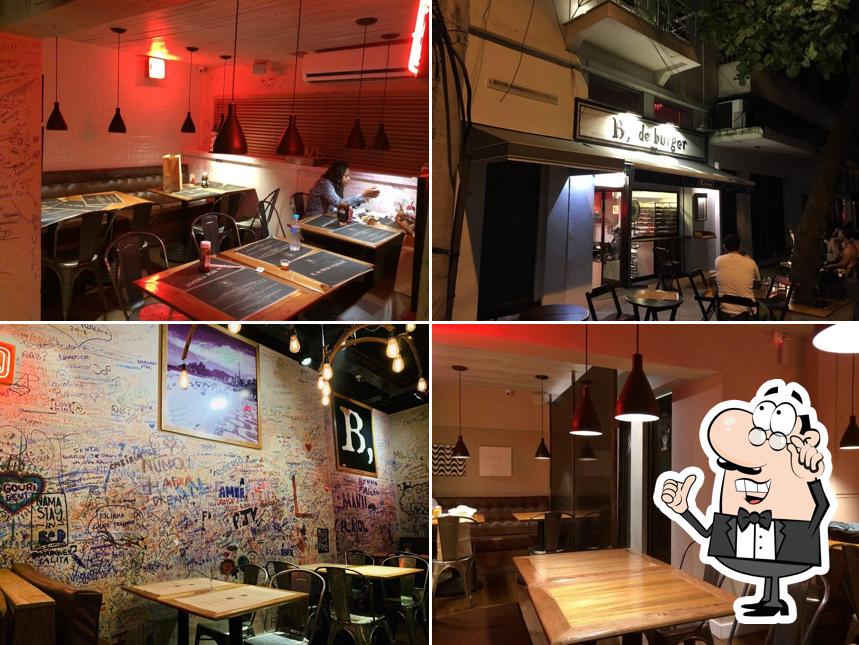 Sente em uma das mesas no B, de Burger