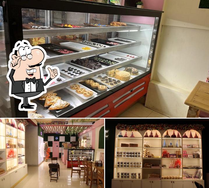 This is the picture showing interior and food at Eclair Bakery Haldwani - Best Bakery Shop in Haldwani