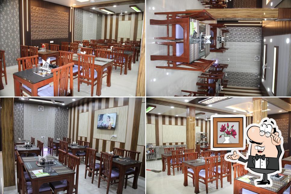 The interior of JMW Cafe & Restro - Best Restaurant/Family Restaurant/Best Cafe