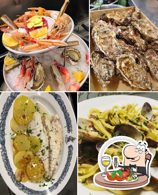 Prenez différents plats à base de fruits de mer servis par Il Corsaro Barberini
