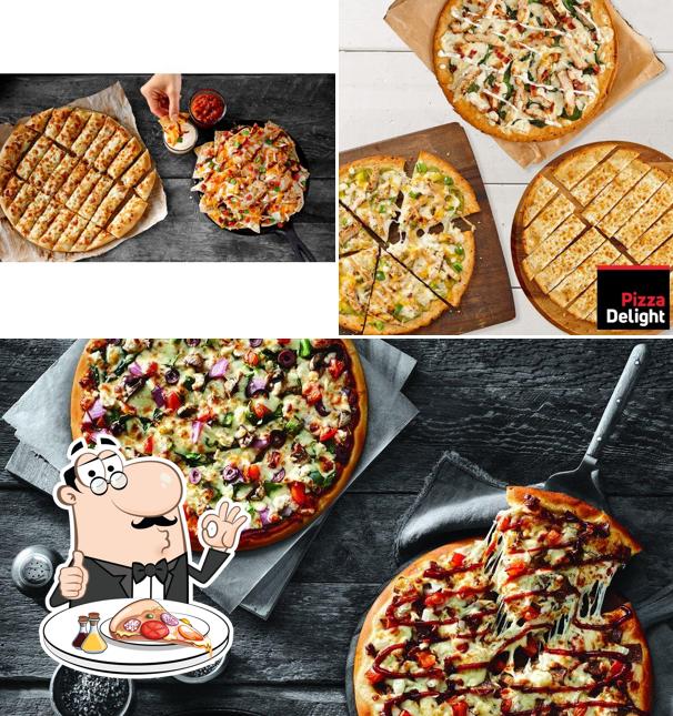 A Pizza Delight, vous pouvez déguster des pizzas