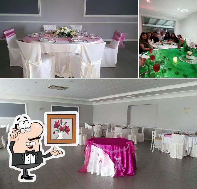 La foto di interni e tavolo da pranzo da Oro Bianco Eventi