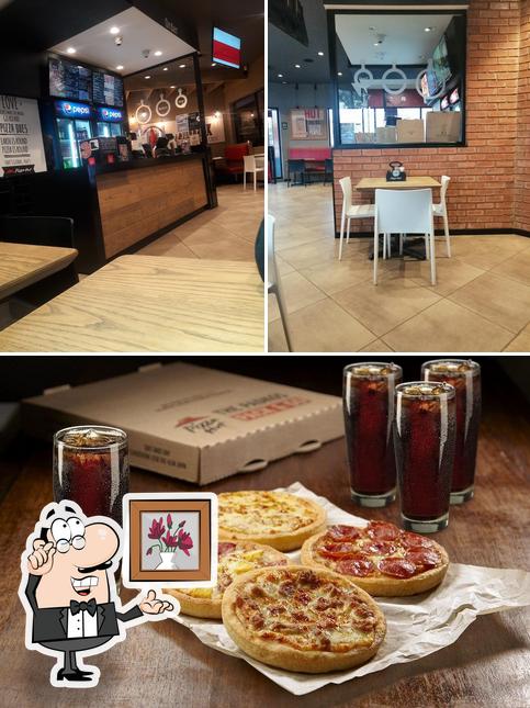 Vérifiez l’image affichant la intérieur et bière concernant Pizza Hut Lenasia