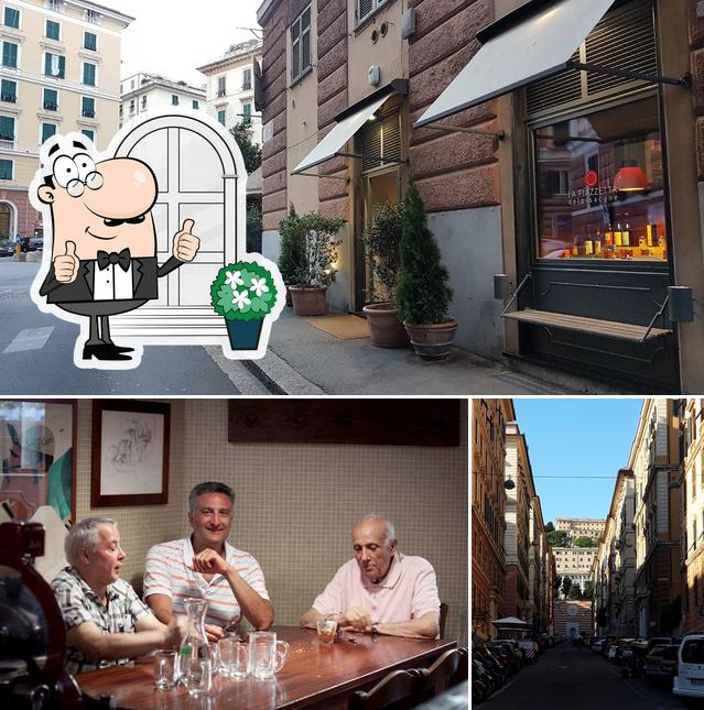 Questa è la immagine che presenta la esterno e tavolo da pranzo di la Piazzetta del Pisacane