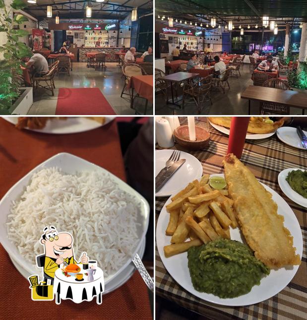 Take a look at the picture displaying food and interior at Tony's Place fish n chips