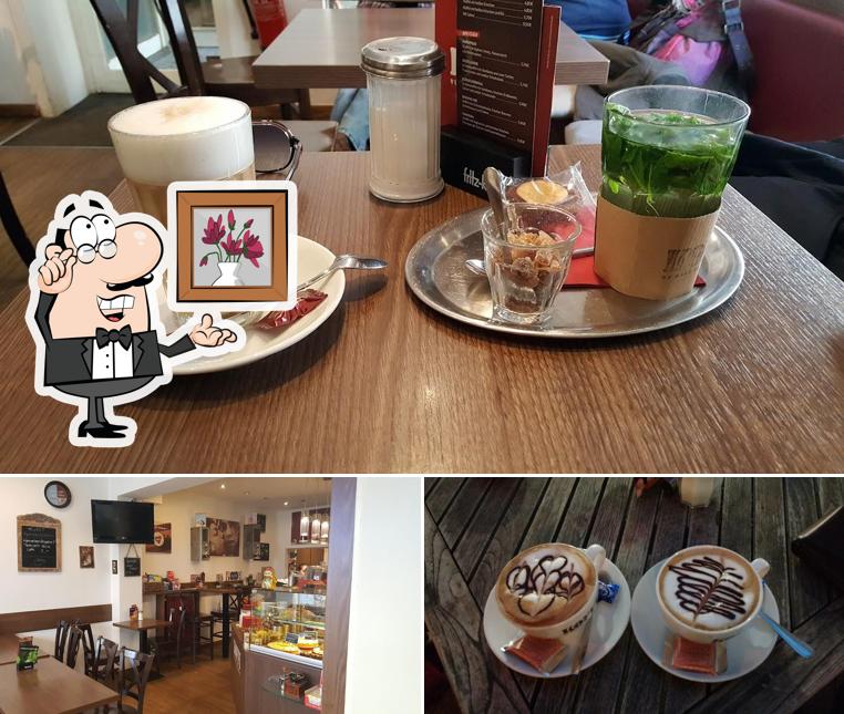 This is the image depicting interior and beverage at Koffi - Neuss