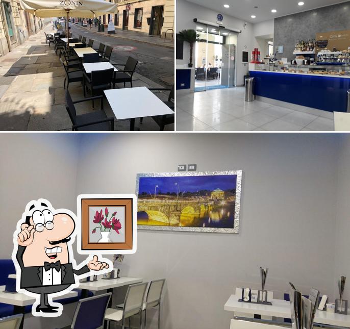 Dai un'occhiata agli interni di Gilda Lounge Bar Caffetteria