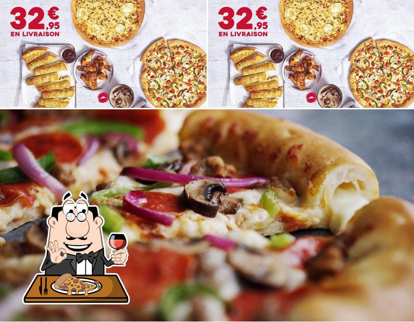 A Pizza Hut, vous pouvez essayer des pizzas