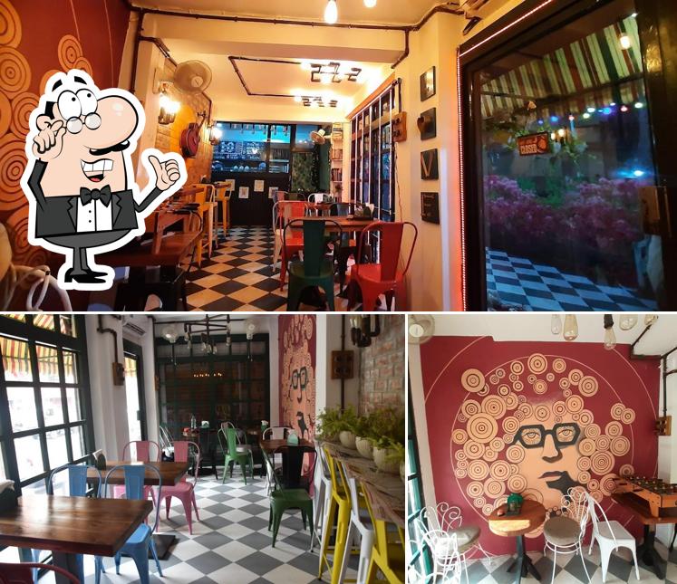Take a seat at one of the tables at Cafe Stories