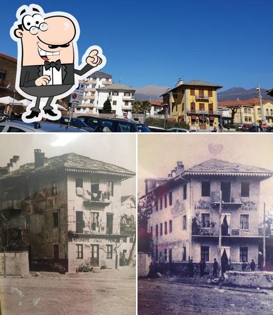 Puoi goderti l'aria fresca da seduto all'esterno di Ristorante Caffè Trattoria Piazza Rolle