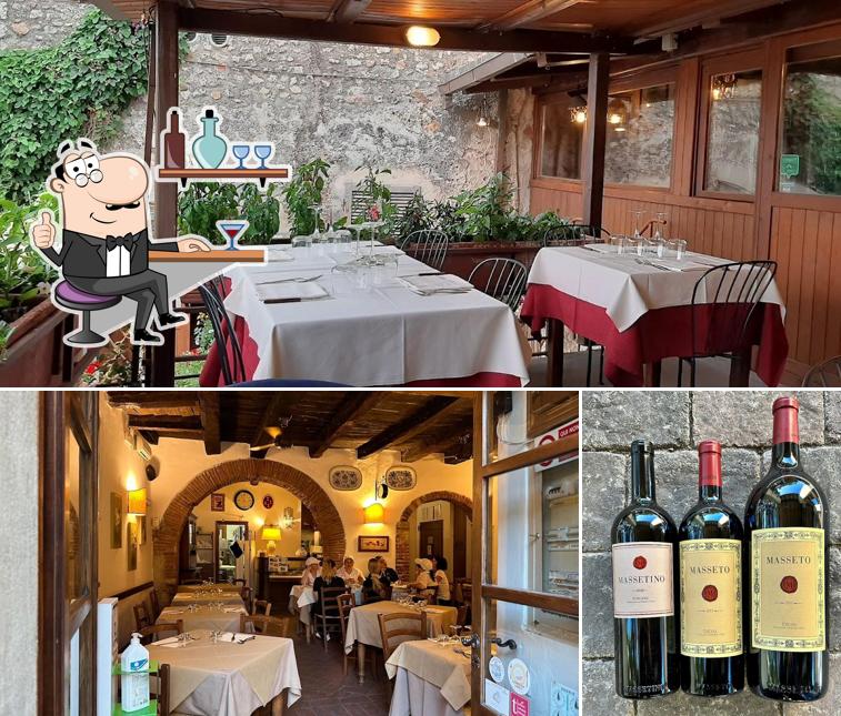 Guarda la immagine che mostra la interni e bevanda di Trattoria Da Carla