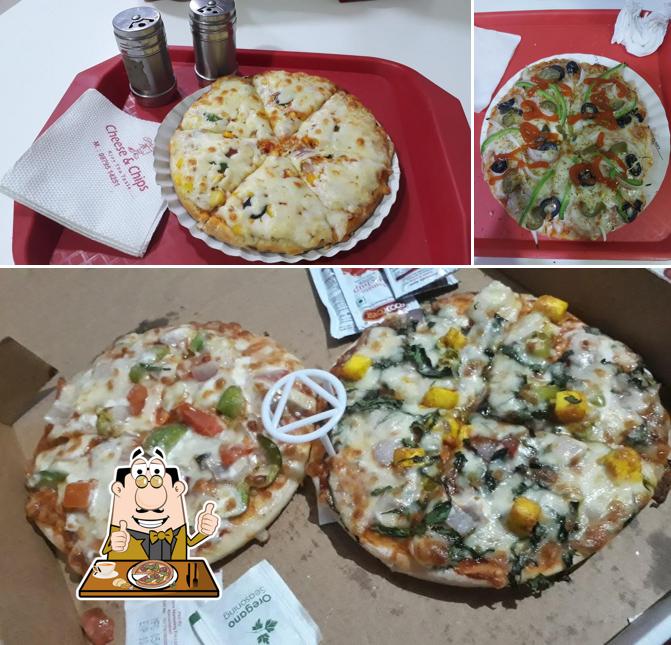 Get pizza at Cheese n Chips
