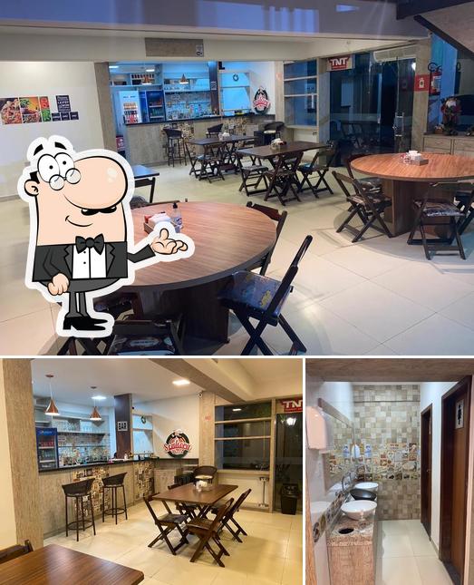 O interior do Pizzaria Senhora Pizza