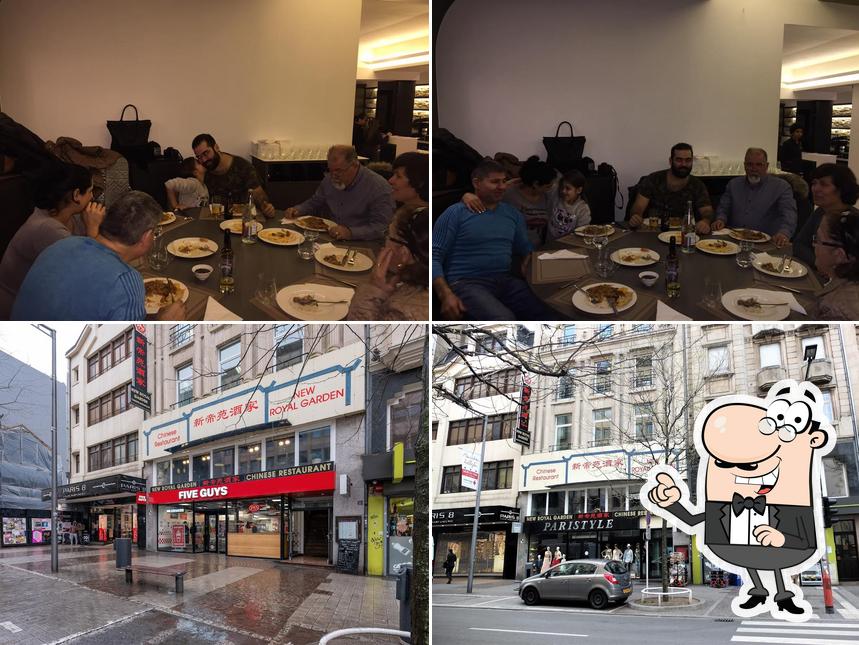 La extérieur et table à manger du restaurant