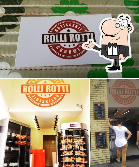 Entre diversos coisas, interior e comida podem ser encontrados a RolliRotti Rotisseria