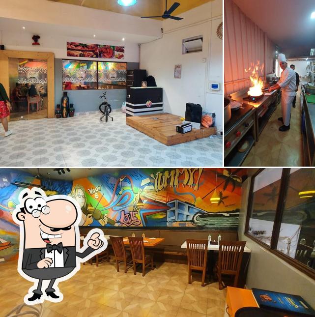 Take a seat at one of the tables at ANNAMAYYA RESTAURANT