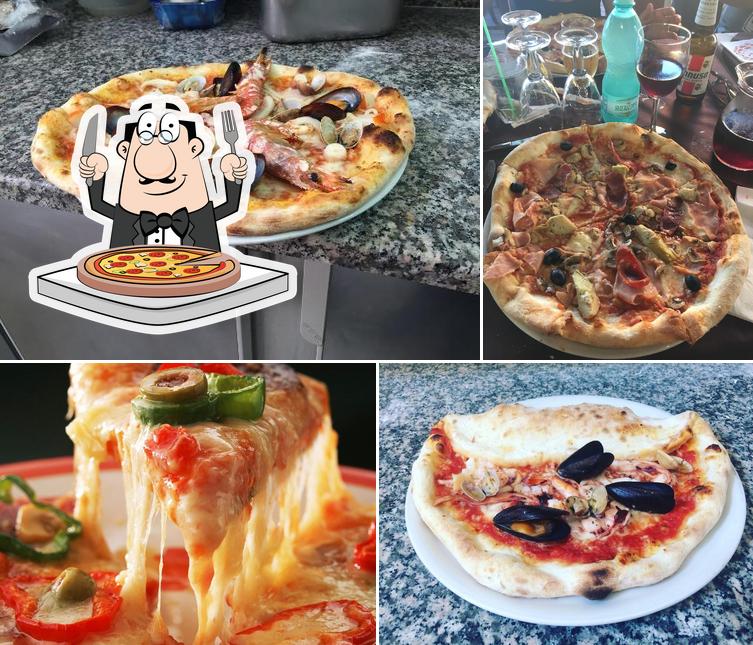 Попробуйте пиццу в "Ristorante Pizzeria La Maison La Caletta"