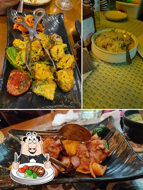 Try out meat dishes at Sandoz Restaurant - Lajpat Nagar