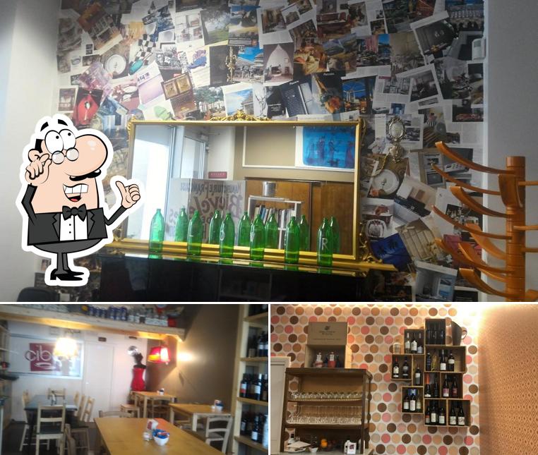 Questa è la foto che presenta la interni e vino di Cibò