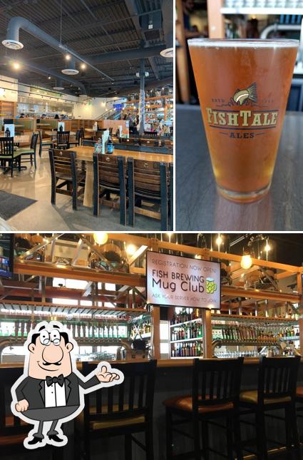 The photo of Fish Brewing Pub & Eatery’s interior and beer