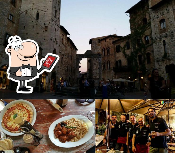 Dai un’occhiata alla foto che mostra la esterno e cibo di Hotel La Cisterna