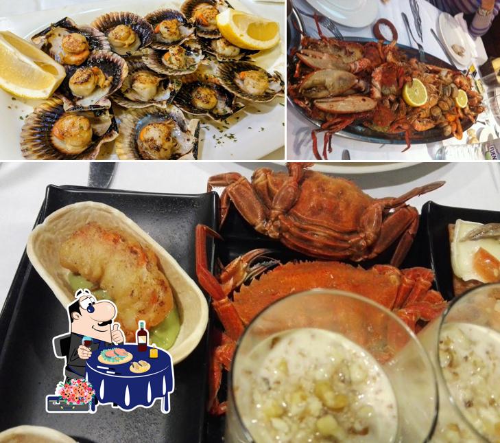 Get seafood at Restaurante Marisquería La Chalana