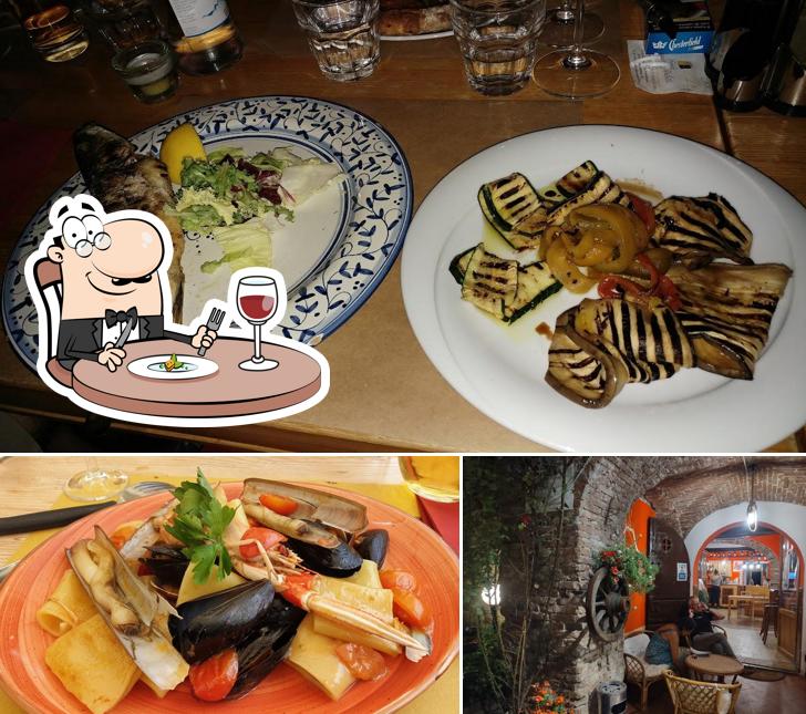 Estas son las imágenes que muestran comida y interior en Pizzeria Osteria Bella Napoli