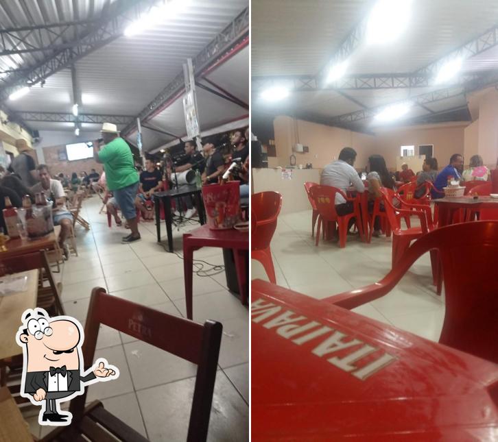Sente em uma das mesas no Espetinho Legal Prime - Cordeiro