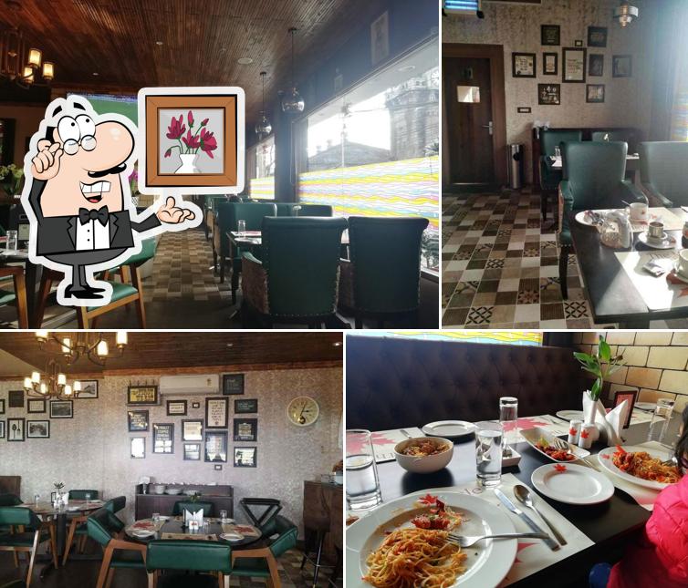 Take a seat at one of the tables at The Maple