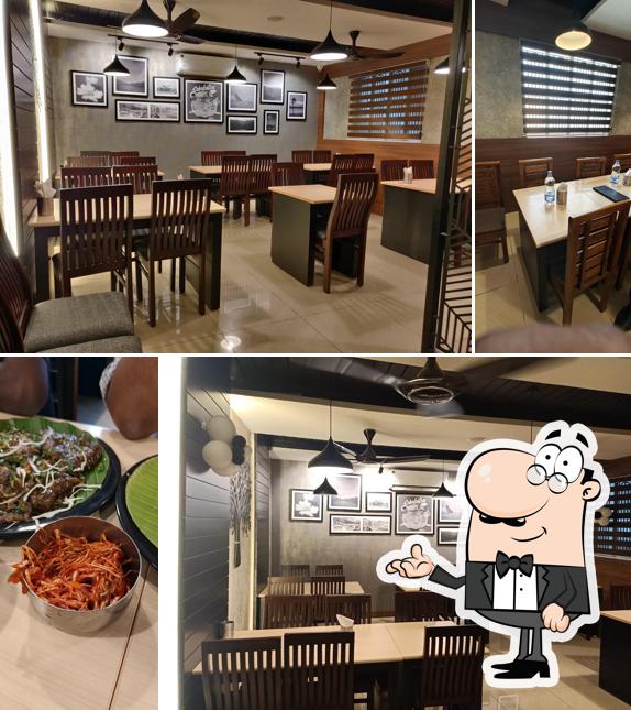 Take a seat at one of the tables at Green Tree Restaurant