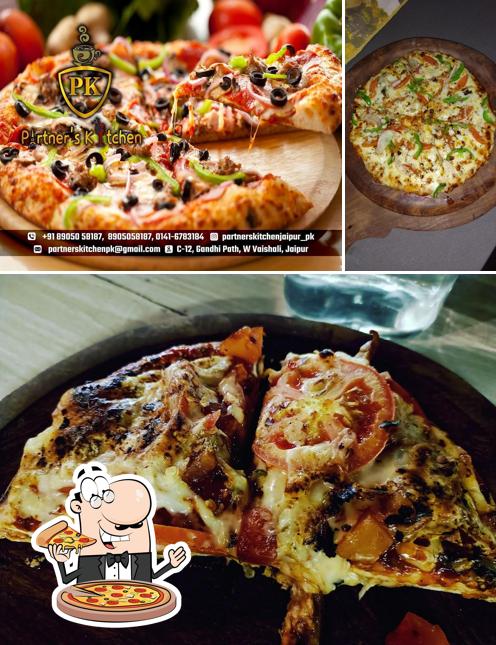 Try out pizza at Partner's Kitchen - PK RoofTop Restaurant in Vaishali Nagar