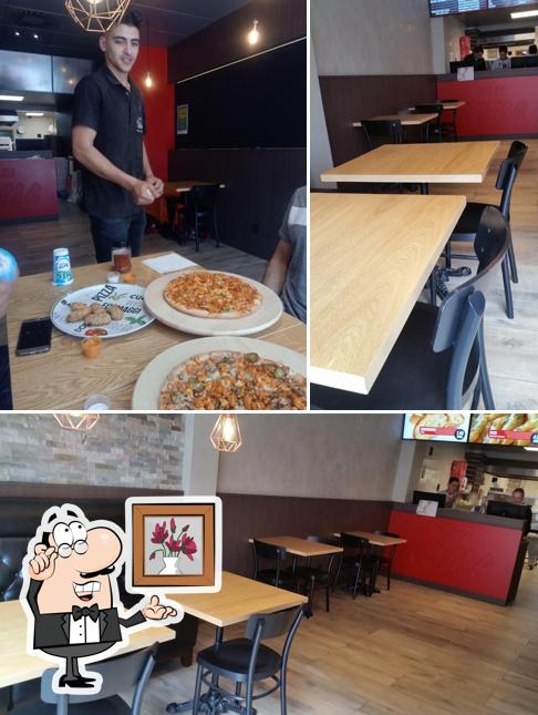 El interior de PIZZA ROMA OVERPOORT