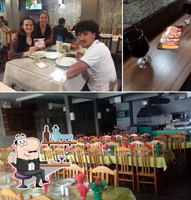 O interior do Restaurante Picanhas Gril e Pizzaria