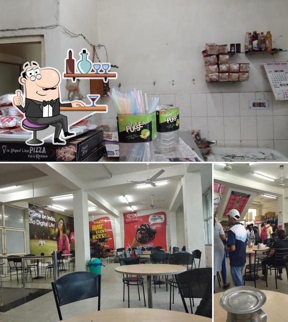 Take a seat at one of the tables at UFO- University Food Orbit