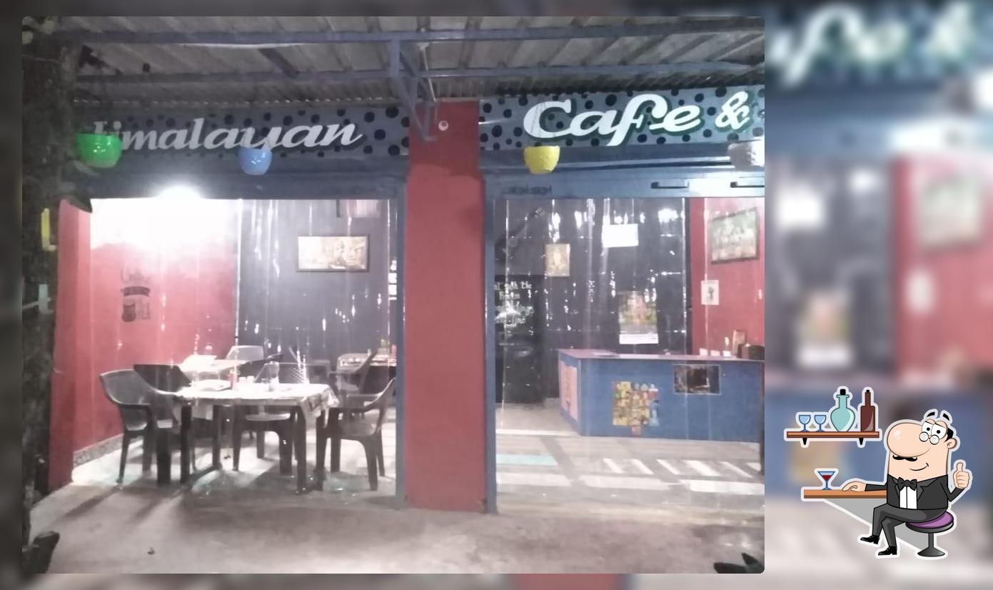 Take a seat at one of the tables at Himalayan Cafe & Retro
