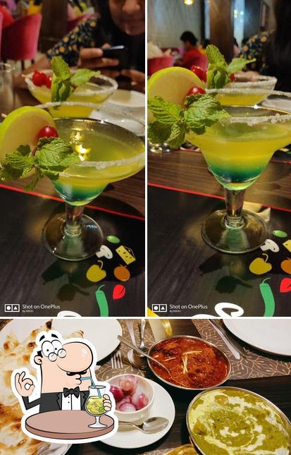 The picture of SEEBO - Authentic Assamese Multi-Cuisine Restaurant’s drink and food