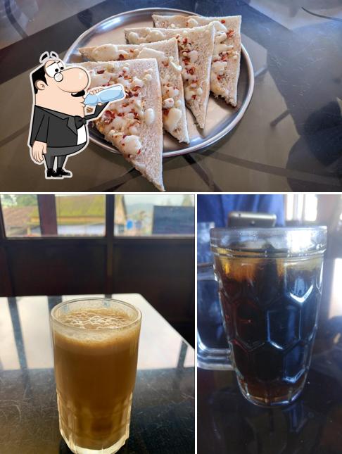 Check out the picture showing drink and food at Willy's Coffee Pub