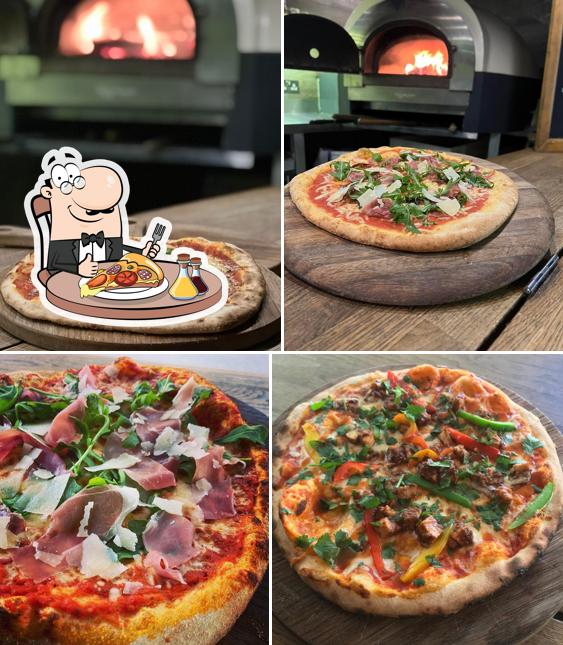 Get pizza at Stoked - mobile wood fired caterer