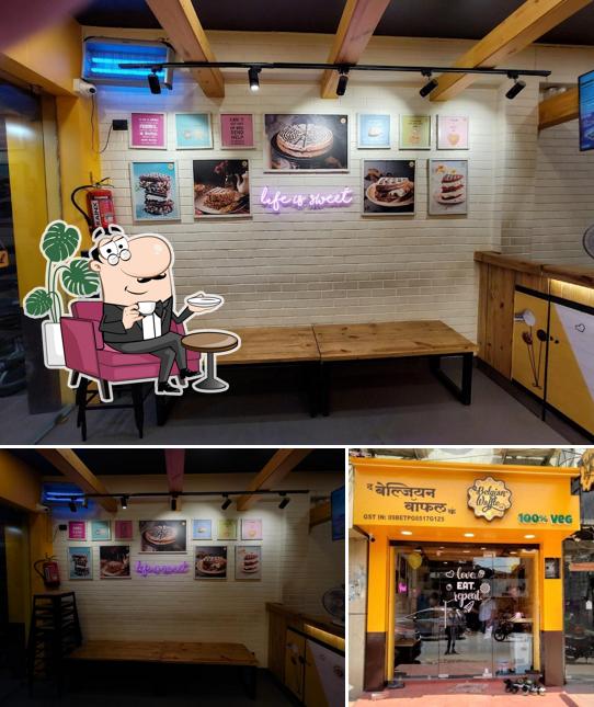 Check out the picture displaying interior and exterior at The Belgian Waffle Co