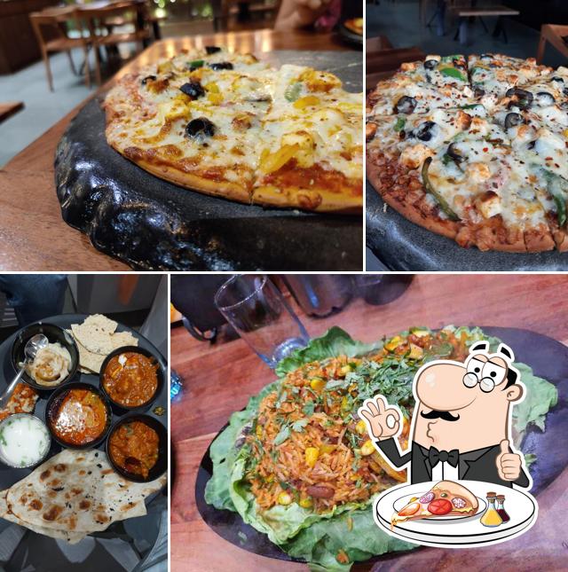 Try out pizza at Hilla Restaurant Cafe