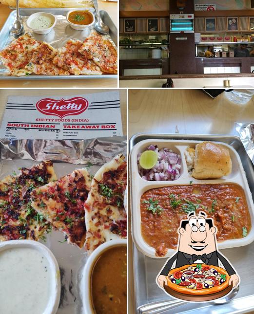 Pick pizza at Shetty restaurant