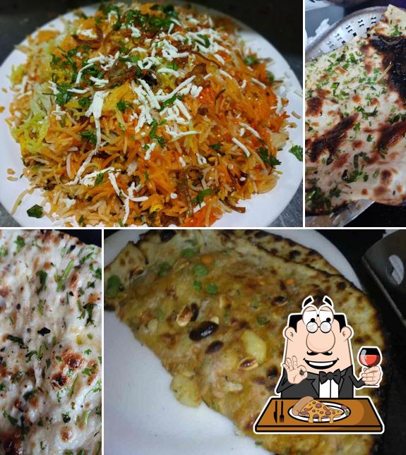Pick pizza at Vasudo Dhaba Inn