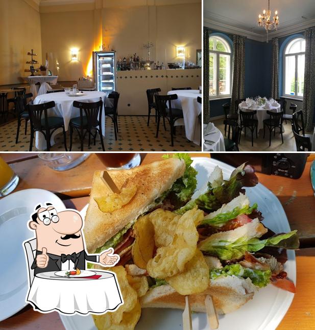 Among different things one can find dining table and sandwich at Annettes Gastronomie im Schloss Heiligenberg