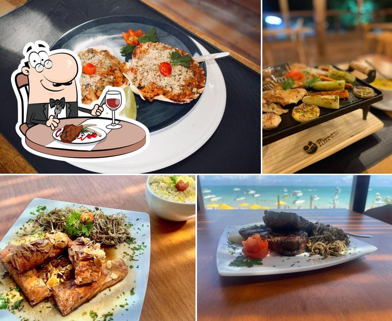 Prove refeições de carne no Restaurante Manoa Beach Club
