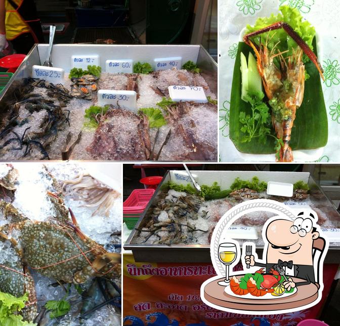 Try out different seafood items served at หลังมอซีฟู๊ด