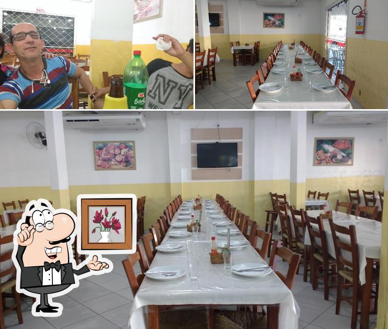 O interior do Mega Pizza