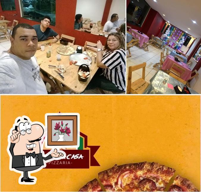 Estas son las imágenes que muestran interior y comida en Pizzaria Sabor da Casa