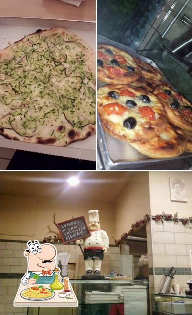 Tra le diverse cose da Pizzeria dell'angolo si possono trovare la cibo e interni